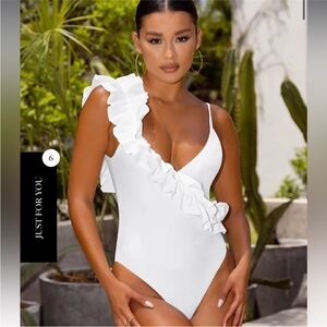White one piece white swimsuit with ruffled sash